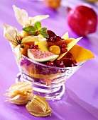 Exotic fruit salad with pomegranate and physalis