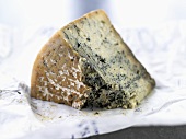 A piece of Cabrales on paper (Blue cheese, Spain)
