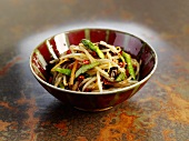 Fried sprouts, asparagus, jelly ear fungus in a bowl