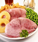 Gammon and pineapple with chips and peas (UK)
