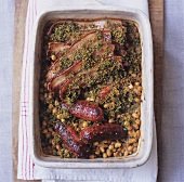 Oven-baked chick-peas, sausages and bacon
