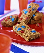 Flapjacks with coloured chocolate beans for children