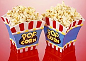 Popcorn in two ceramic popcorn bowls