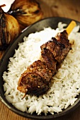 Spicy beef kebab on rice