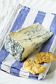Yorkshire Blue cheese with cracker on tea towel