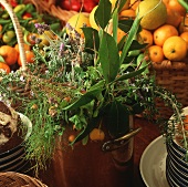 A display of fresh herbs and fruit