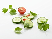Cucumber slices, tomato, basil and parsley