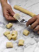 Shaping gnocchi with a fork