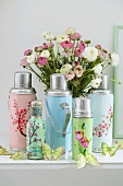 Pastel-coloured, flower-patterned Thermos flasks