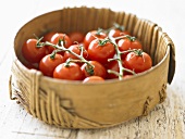 Cherry tomatoes in a wooden bowl