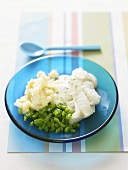 Cod with parsley sauce, mashed potato and beans