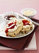 Raisin scones with clotted cream and jam