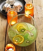 Punch with kiwi fruit and citrus fruit for Halloween