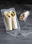 Wraps in plastic packaging to take away