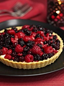 Christmas blackberry and raspberry tart