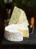 Camembert and blue cheese on a board (Christmas)