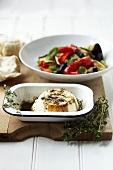 Baked ricotta with thyme dressing and vegetables