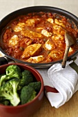 Chicken in tomato sauce with broccoli