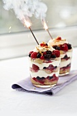 Berry trifle with burning sparklers