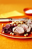 Fillet of lamb with chick-peas and red onions