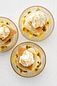 Individual trifles with passion fruit sauce (overhead view)