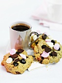 Chocolate chip and marshmallow cookies with coffee