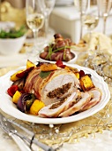 Christmas turkey breast wrapped in bacon with date and plum stuffing
