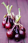 Bunches of red onions