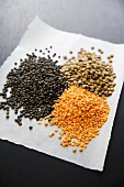 Various lentils on a piece of paper