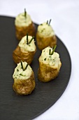 Mini jacket potatoes with chives