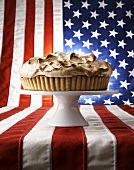 A lime meringue pie on a US flag