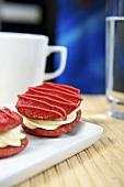 Raspberry whoopie pies filled with cream