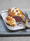 Beef Wellington with mushrooms and Prosciutto