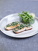 A parsley and tarragon mixture on salmon