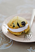 Whoopie Pie with blueberries on a plate with a fork