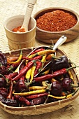 Various types of chilli peppers and chilli flakes