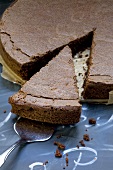 Chocolate cake, partly sliced