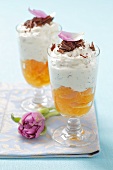 Cheesecakes in glasses with mandarins