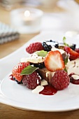 Kaiserschmarrn (shredded sugared pancake from Austria) with ice cream and berries