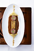 Venison roulade with bread dumpling and savoy cabbage lasagne