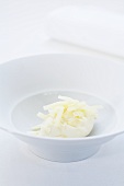 Vacherin ice cream with grated sheep's cheese