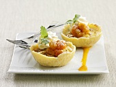 Tartlets with cloudberries and cream