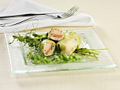 Lettuce leaf rolls filled with smoked salmon and a pea vinaigrette