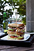 Club sandwich with grilled fish