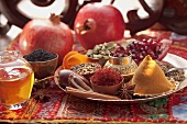An arrangement of spices with pomegranates (Arabia)