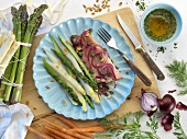Asparagus with smoked trout and onions
