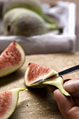 Figs being peeled