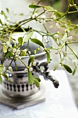 Mistletoe sprigs in an old samowar