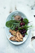 Sour cherry salad with roast guinea fowl