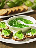 Bread topped with cream cheese and basil jelly